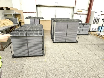 Multiple aluminum radiator units packed together for container shipping