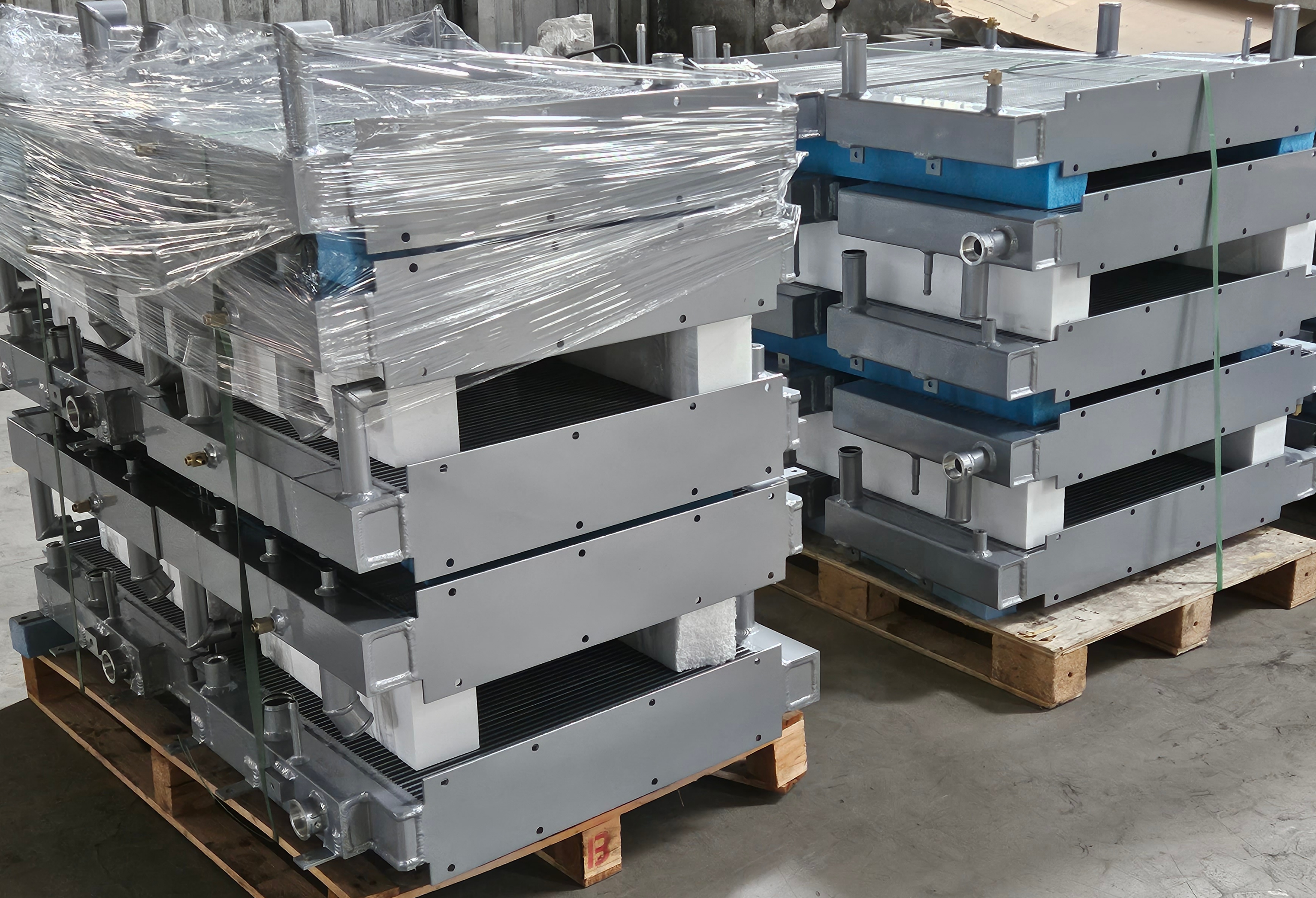 Aluminum radiators packaged in wooden crates for mining cooling systems