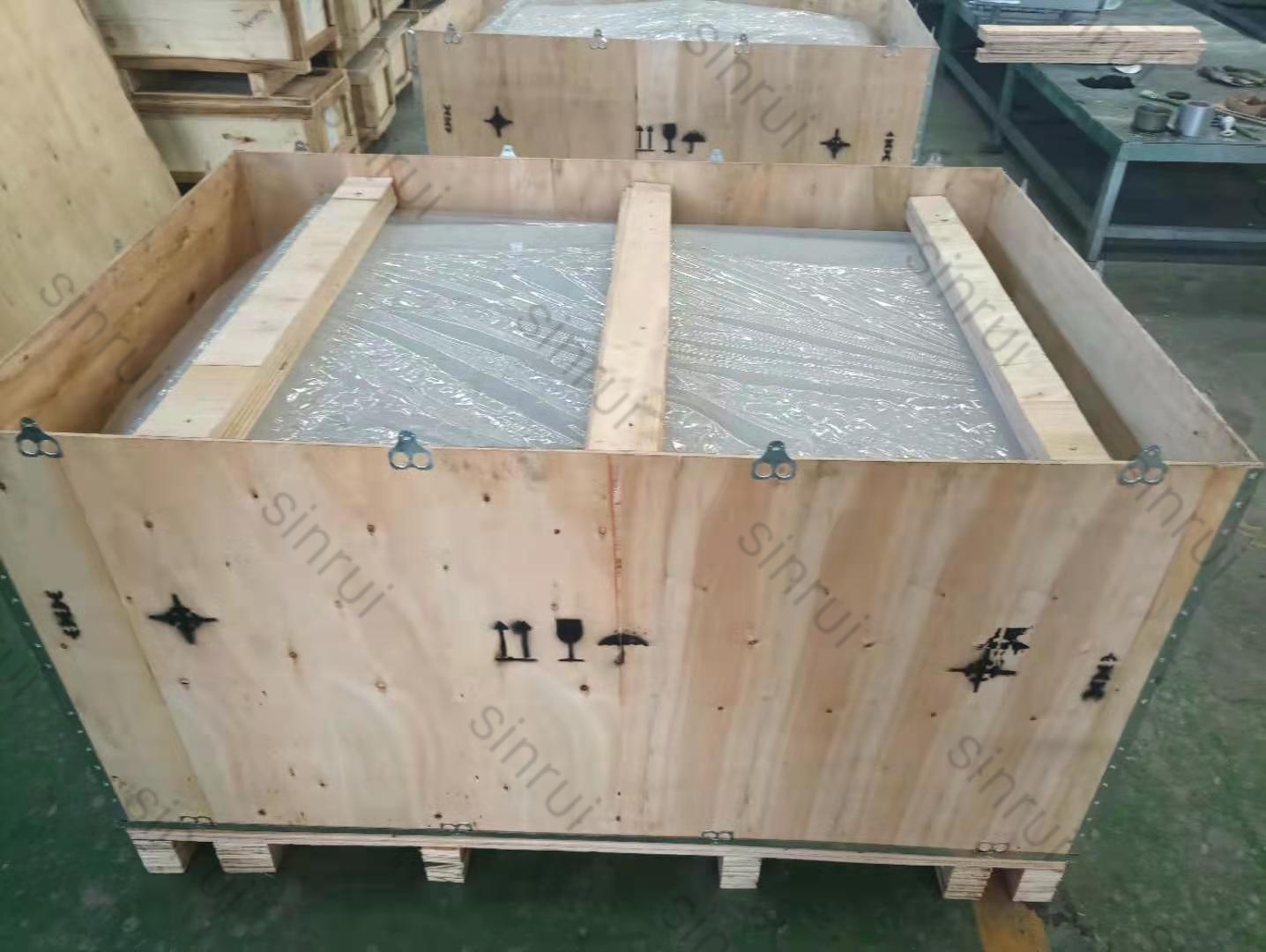 Wärtsilä engine charge air cooler packed in wooden crate for export