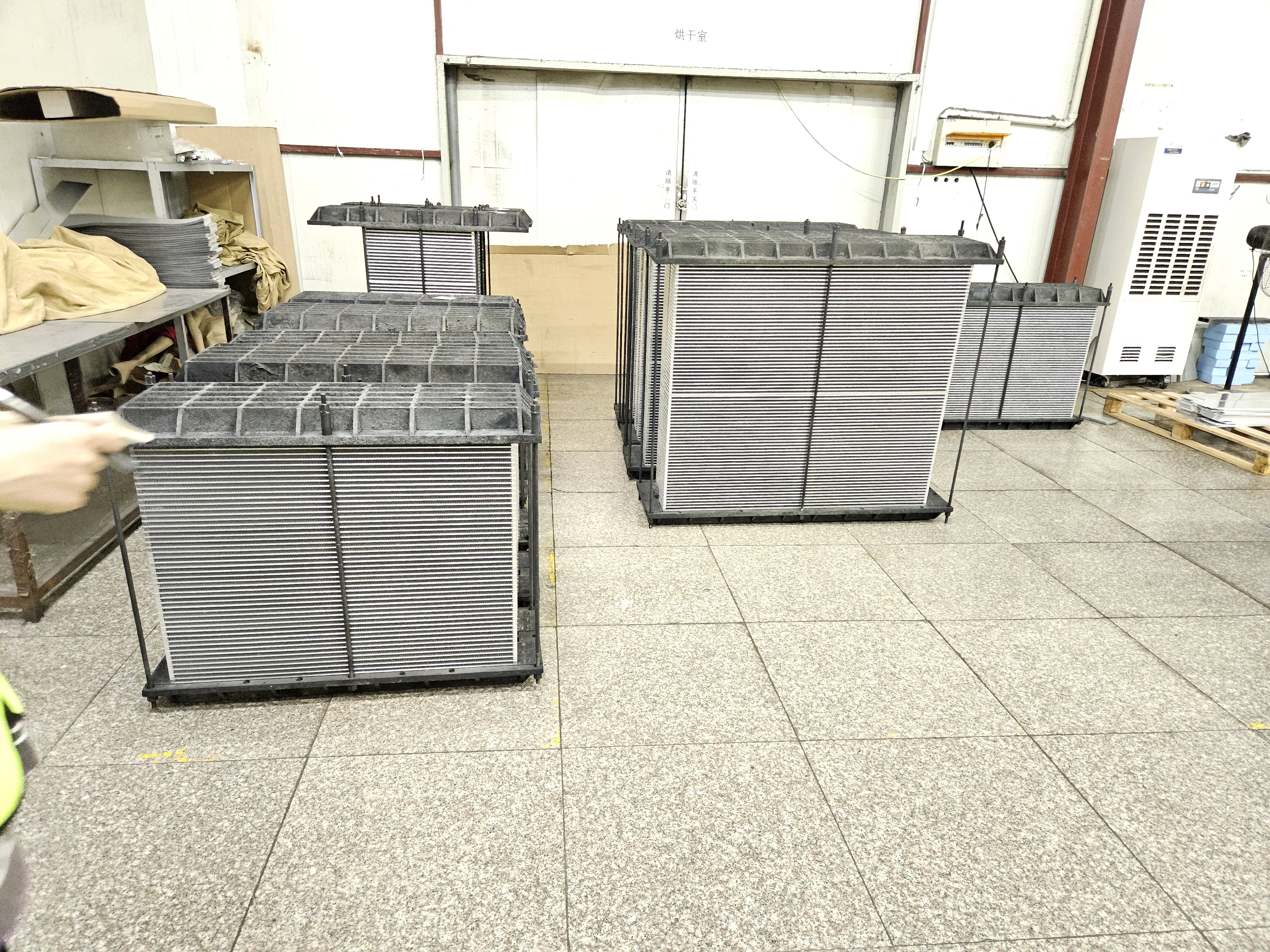 Multiple aluminum radiator units packed together for container shipping