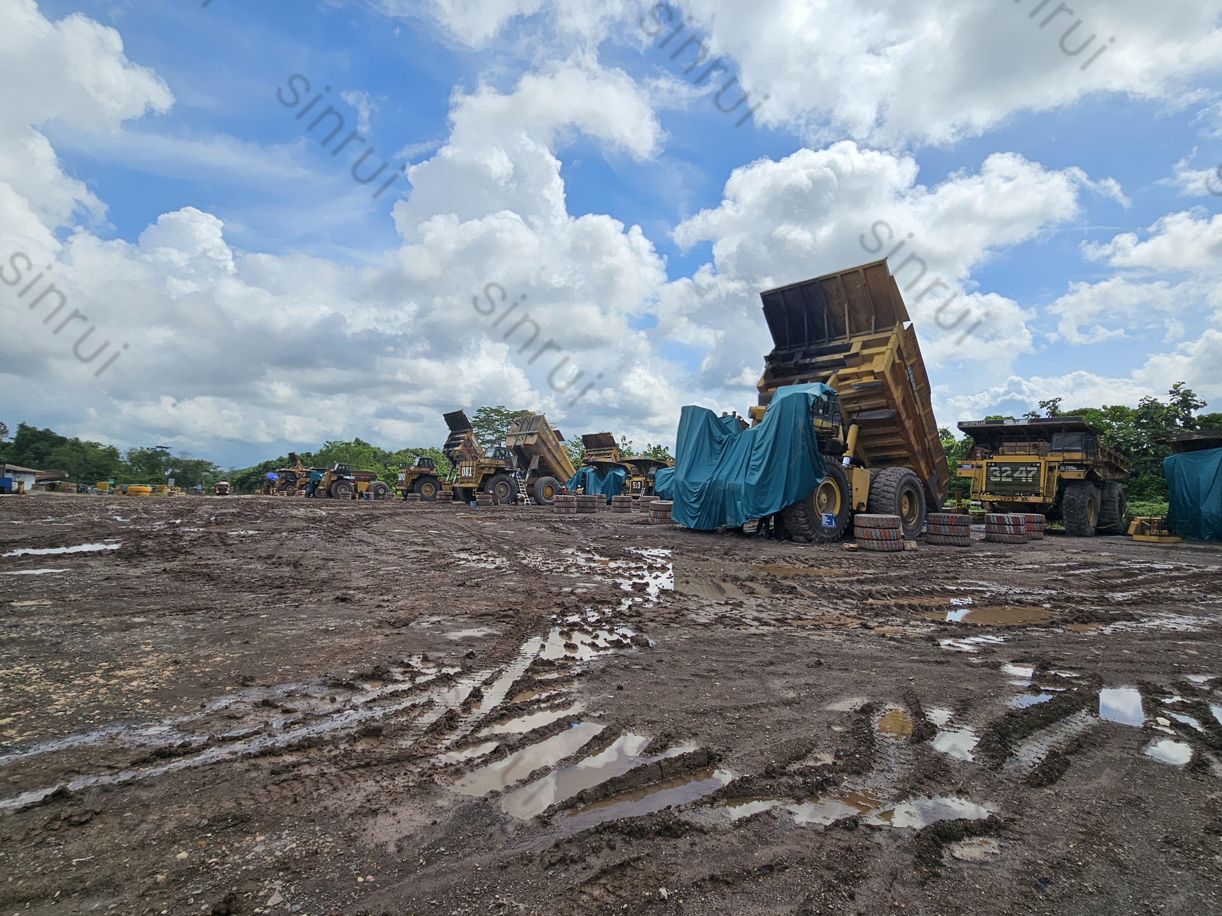 Damaged front radiator of CAT 785C mining truck after accident