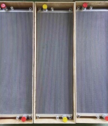 Dual aluminum intercooler cores mounted in wooden frame for shipment