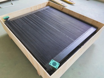 Curved aluminum radiator core demonstrating flexible fin arrangement