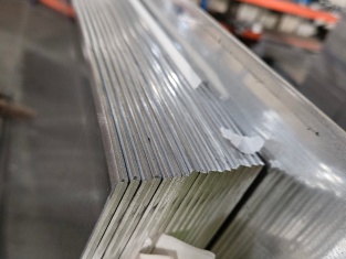 Stacked aluminum fin blanks prepared for SINRUI radiator cores