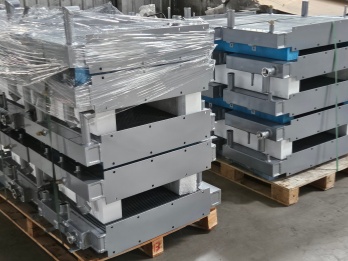 Aluminum radiators packaged in wooden crates for mining cooling systems