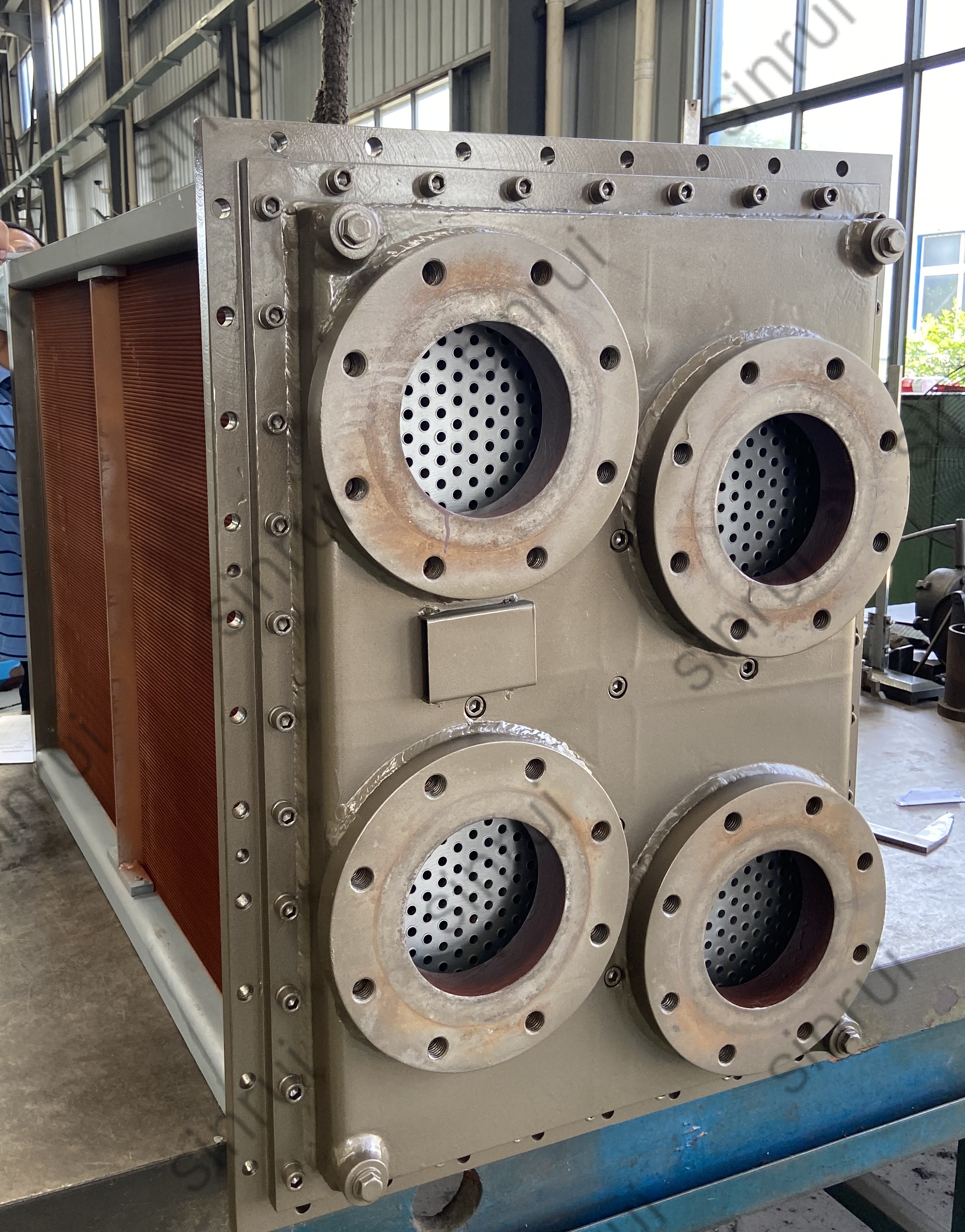 Charge air cooler for Wärtsilä 18V46 engine with copper fins and 90/10 Cu-Ni tubes