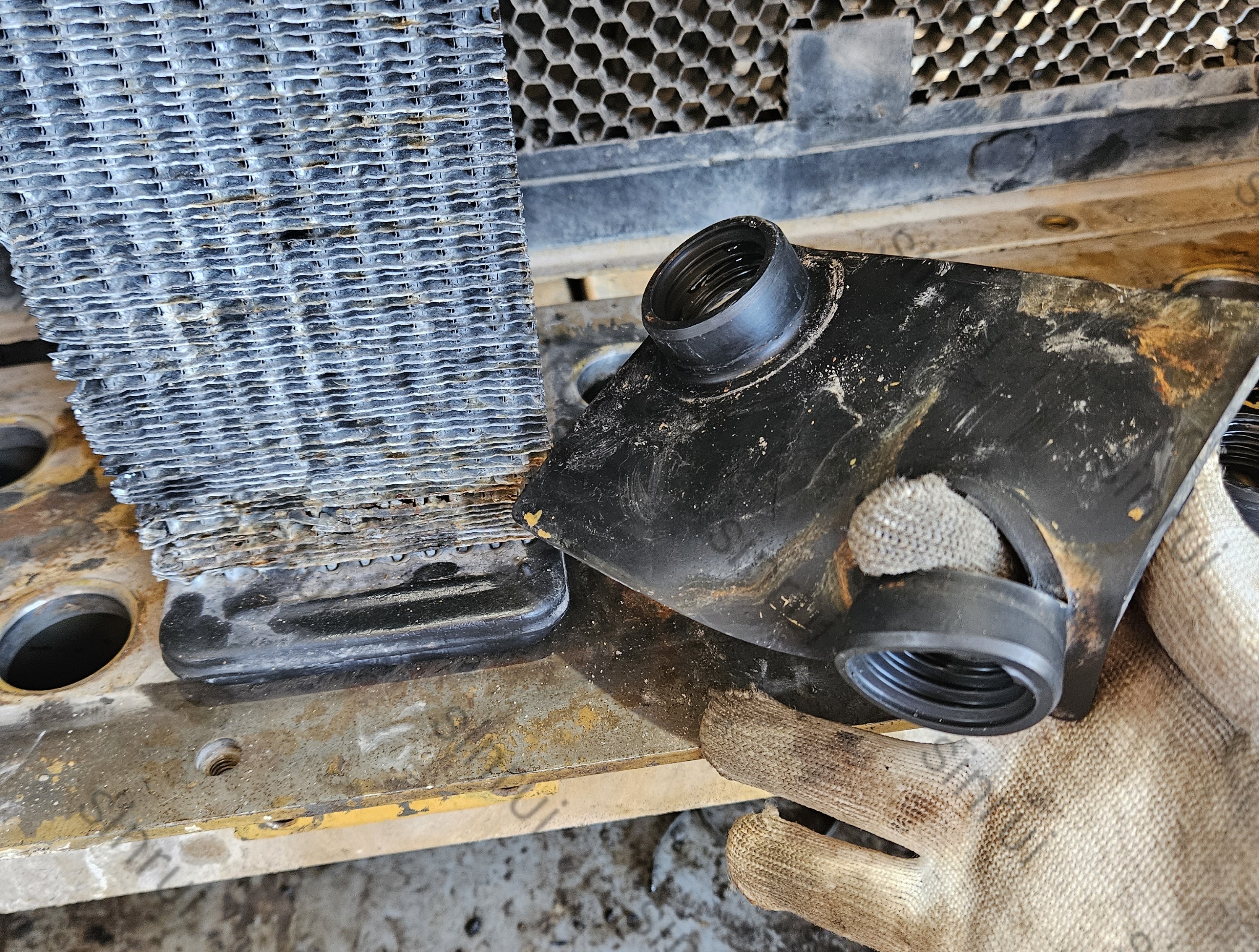 OEM Corroded steel AMOCS radiator core system & Failed rubber mounting parts in mining dozer radiator