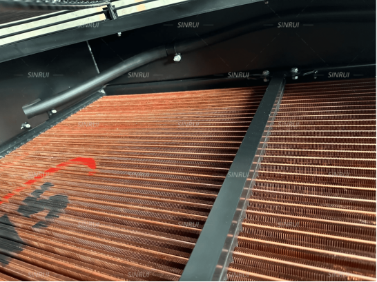 Detail of the replaceable copper-tube radiator/CAC core
