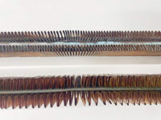 Uneven arrangement, excessive fin spacing, and oxidized, poor-quality tubes.